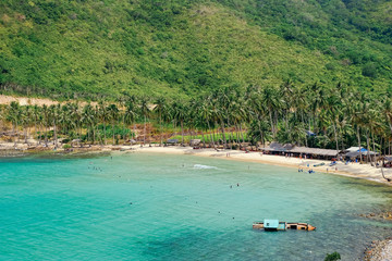 The beautiful tropical beach of Nam Du, the paradise island with the coast, white sand, clean water, boat, forest and blue sky. Nam Du island is a popular tourist destination in Kien Giang, Vietnam