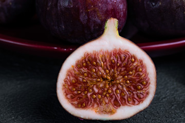 Close-up fresh figs on dark background