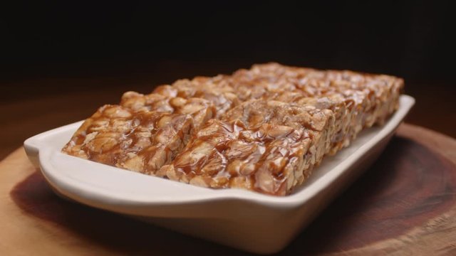 A traditional Brazilian sweet called pe de moleque. Made from peanuts and caramel