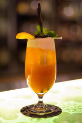 Portrait Of Singapore Sling Cocktail On Glass Table