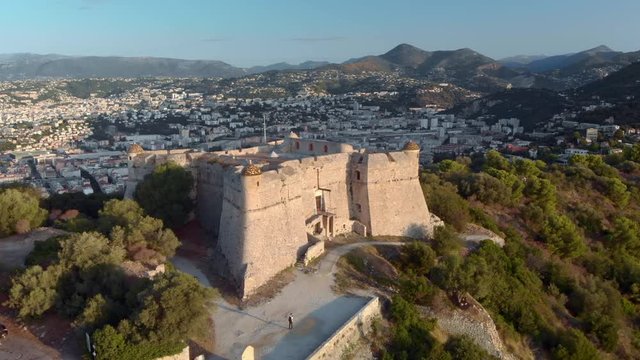 Mont Alban fort drone footage with sea view. Nice in France aerial 4K pull back shot. Sunrise over Mont Boron in Nizza at French Riviera. 