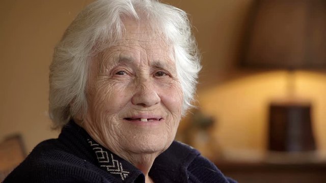  nice elderly toothless lady smiling at camera