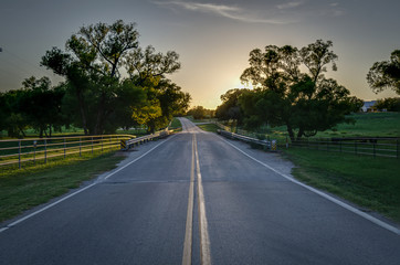 Fototapeta na wymiar Road at sunset in Weatherford, TX
