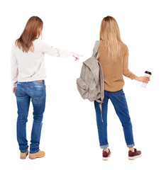 Back view of two pointing girl in sweater.