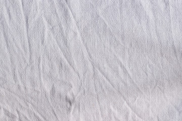 Fototapeta na wymiar Natural linen fabric texture. Rough crumpled burlap background
