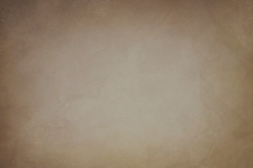 old crumpled paper with watercolor stains texture or background with dark vignette borders