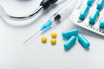 Capsule pills and syringe vaccine concept