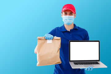 Delivery man in uniform hold craft paper packet with food isolated on blue background. Male employee in cap t-shirt working as courier. Service concept. Mock up copy space