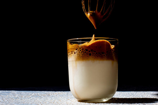 Dalgona Coffee - Korean Trendy Coffee on Dark Background Studio