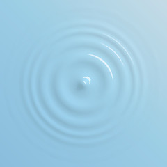 Water drop falling on water surface, top view background