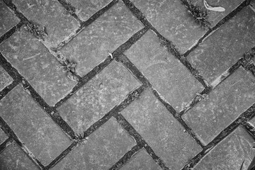 Old brick wall, old texture of red stone blocks closeup.