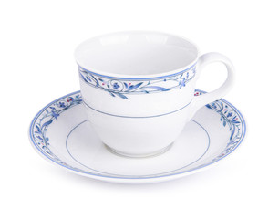 White ceramic tea cup with a minimalistic design and a round shape isolated on a white background.