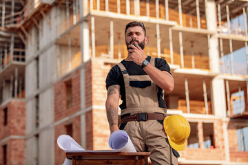 Young architect working outside