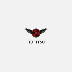 jiu jitsu logo with wings and wood pattern shield