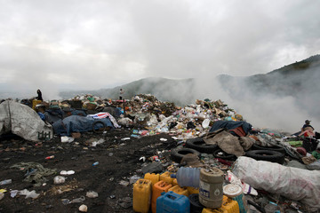 burning plastic trash and rubbish mountain in Myanmar 