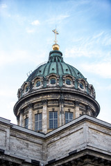 Fototapeta na wymiar Dome of the Kazan Cathedral in St. Petersburg in the afternoon. cross on the dome of the cathedral