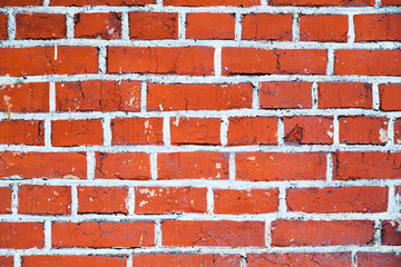 uniform red brick wall with white lines