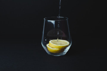 Gin tonic isolated on black background