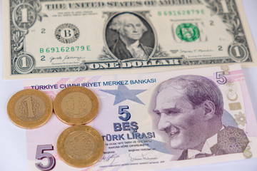 One American dollar and five Turkish Lira banknotes and three turkish  coins. Turkish lira...
