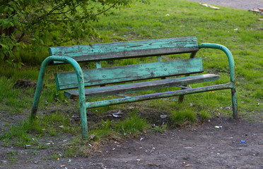 Old broken wooden street bench