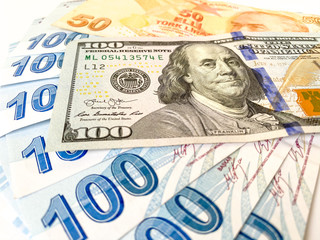 Turkish Liras and one hundred American Dollar. Turkish lira depreciates against the US dollar