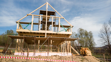 Framing of a new wooden house under construction