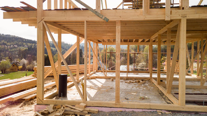 Framing of a new wooden house under construction