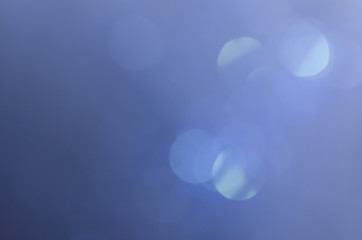 blur background abstract blue color. defocused glittering of glitter beautiful colorful soft effect pattern design for backdrop or wallpaper.