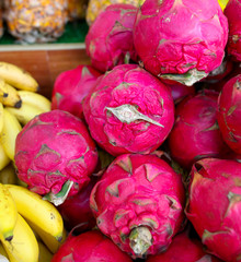 Dragon fruit on the counter at the market.