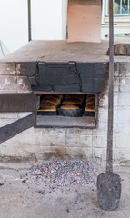 Fresh and crunchy home made bread, baked in traditional stone wood oven.