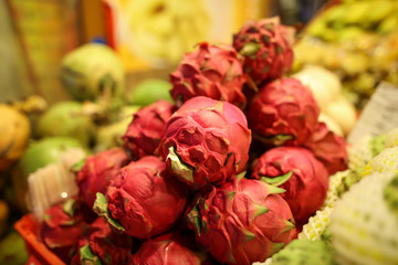 Dragon fruit on the counter at the market.