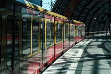 S-Bahn train  at emtpty  train station (Hauptbahnf) in Berlin