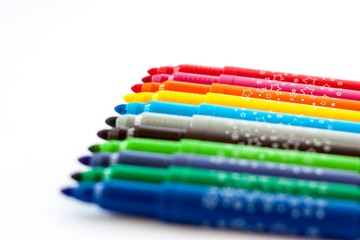Bright markers for design. Markers on a white background. Markers for drawing.