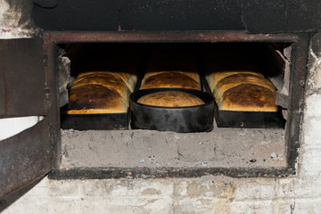 Fresh and crunchy home made bread, baked in traditional stone wood oven.