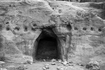 Details of hand carved of Urn Tomb in black and white, Royal Tombs of Petra, Jordan