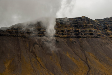 Clouds Covering Mountain Ridge in Iceland