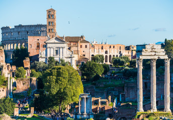 Roman Forum in Rome, Italy with ancient columns and Colosseum