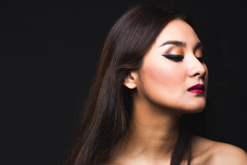 Fototapeta premium Portrait of young asian woman with makeup long hair.