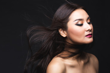 Naklejka premium Portrait of young asian woman with makeup long hair.