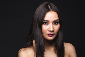 Portrait of young asian woman with makeup long hair.