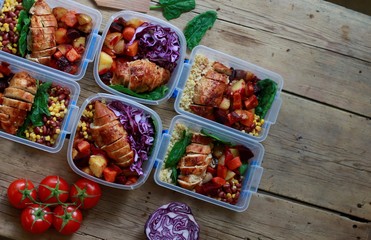 Restaurant offering takeout/delivery during the coronavirus pandemic. Prepared meals (meat, sauce, vegetables) in plastic containers. Ready-to-eat food from a certified home-kitchen, restaurant, cafe