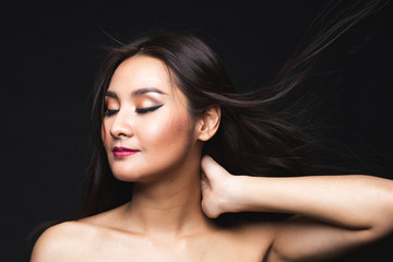 Fototapeta premium Portrait of young asian woman with makeup long hair.