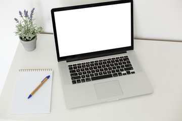 Fototapeta premium Laptop with blank screen on table