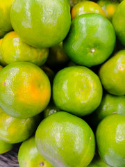 Beautiful texture fresh lemon orange lime tangerine and grapefruit background, fruit orange pattern