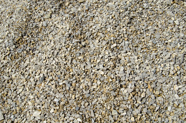 Texture of fine gravel photo in the sunshine