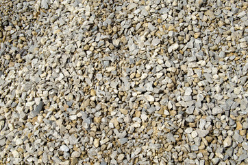 Texture of fine gravel photo in the sunshine