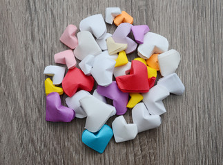 Origami hearts on wooden