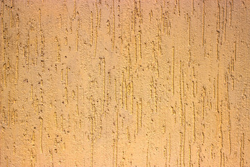 texture of plastered yellow wall