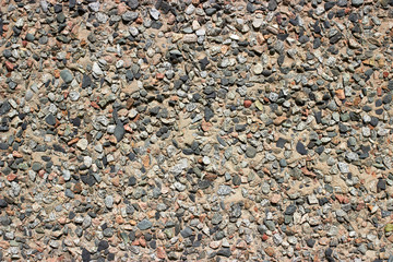 texture of concrete wall with pebble stones