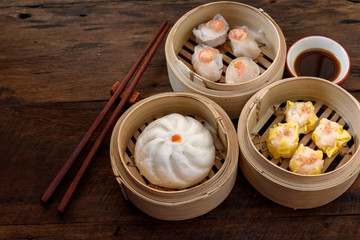 Steamed Bun in steamed dish in a bamboo steamer box to enjoy the sweet tenderness of dried sakura...